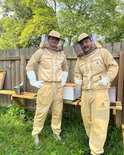 Family wearing ApiArmor beekeeping protective suits
